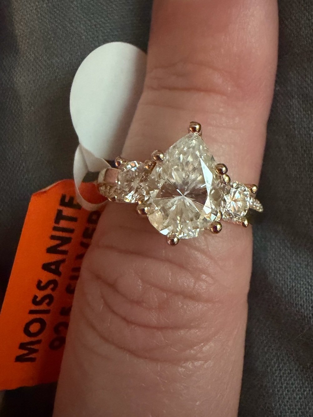 Size 7. 3ct. Gold Pear-Cut Moissanite Three-Stone Ring - Clear/Gold